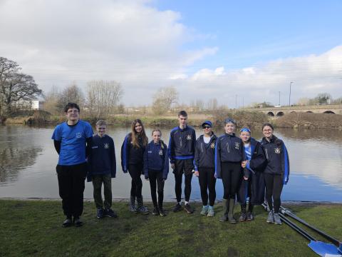 Trent juniors standing by the river Trent